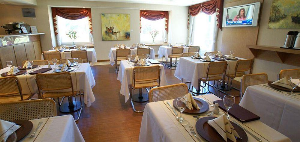 Hotel Aeroparque Inn & Suites Buenos Aires Restaurant photo